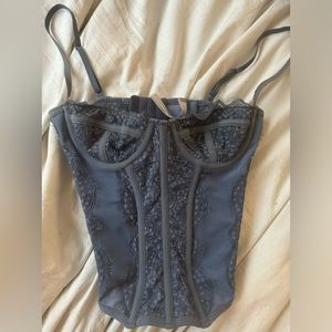Out from under blue urban outfitters corset top size small.